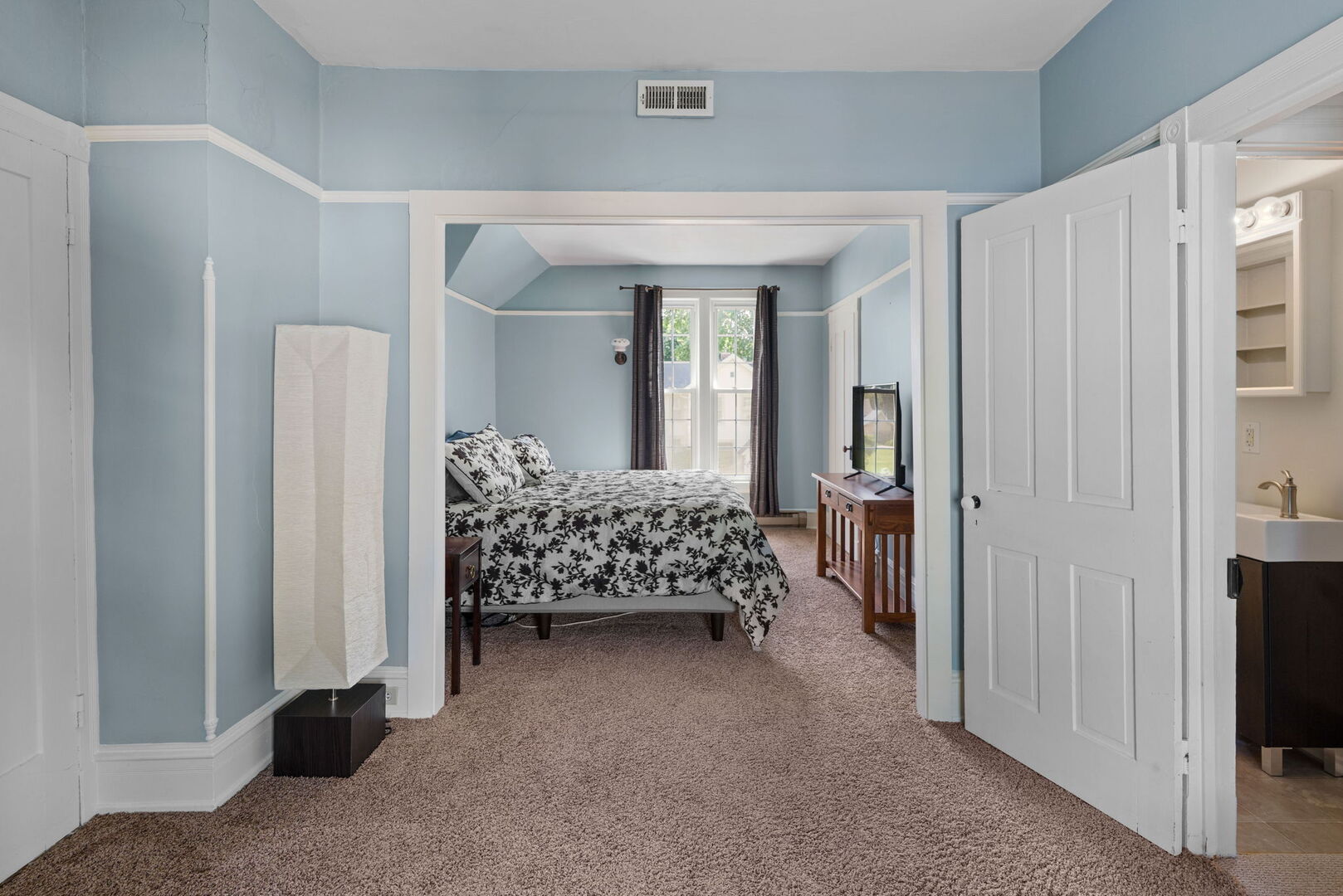 417 North State Street Geneseo, IL 61254 - Photo 30 of 51 a bed room with a bed and a couch