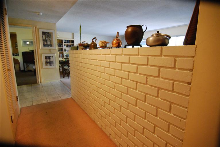 712 Cuyama Road Ojai, CA 93023 - Photo 16 of 21 a bedroom with a bed and cabinets