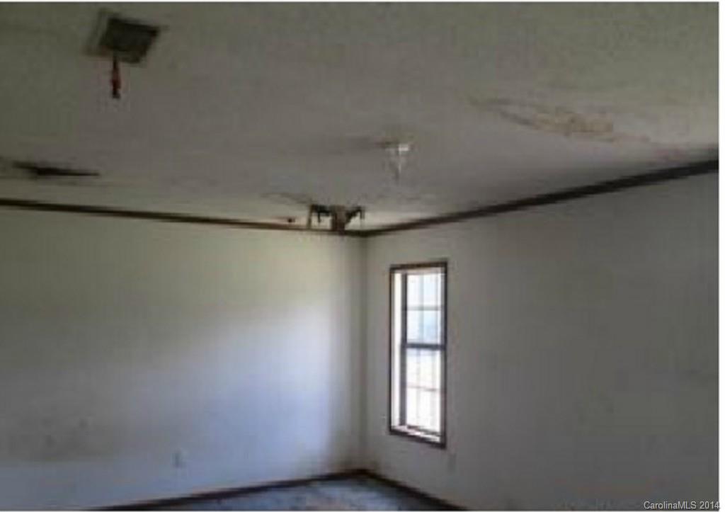 3637 Mt Pleasant Road South Concord, NC 28025 - Photo 5 of 7 a view of an empty room with a window