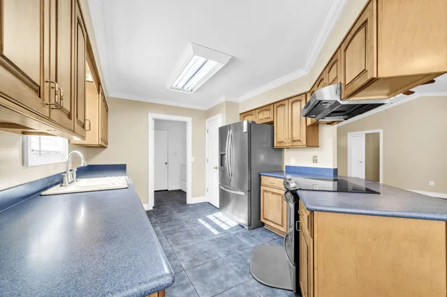 a view of empty room with windows