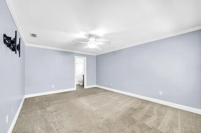 a kitchen with stainless steel appliances granite countertop a refrigerator a sink and a stove