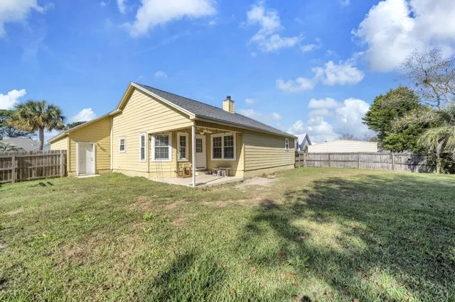 a view of a backyard with a garden