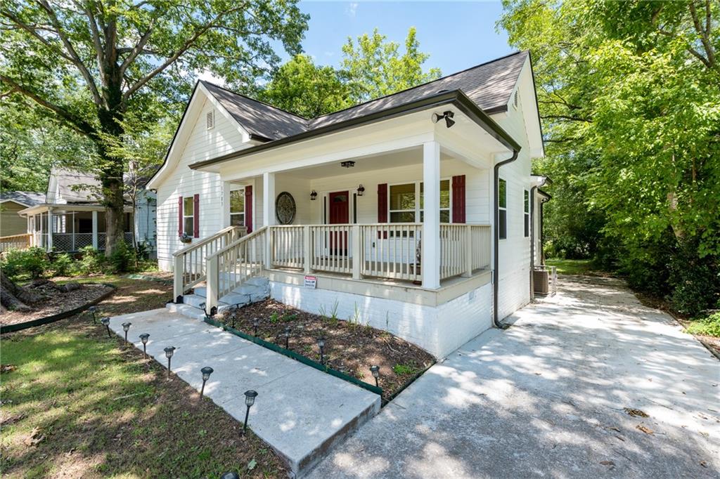 1783 Ware Avenue Atlanta, GA 30344 - Photo 1 of 1 a front view of a house with garden