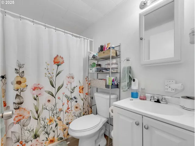 a kitchen with cabinets appliances and a sink