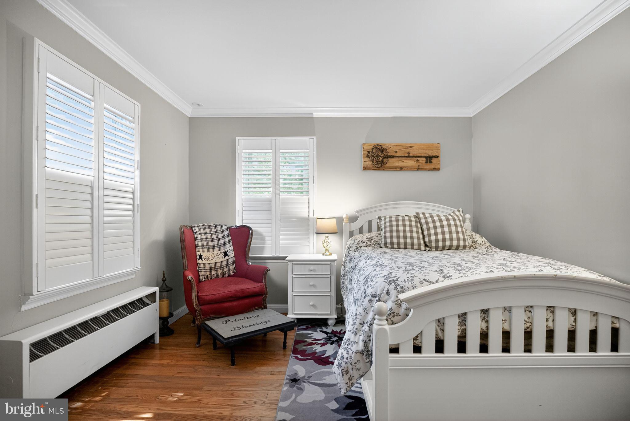 927 Sherman Avenue Huntingdon Valley, PA 19006 - Photo 16 of 29 a bedroom with furniture and windows