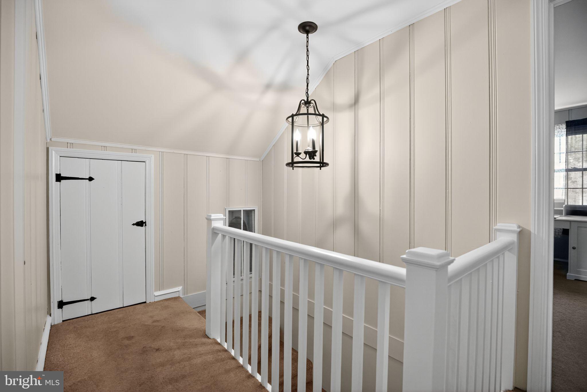 927 Sherman Avenue Huntingdon Valley, PA 19006 - Photo 19 of 29 a view of a hallway with windows