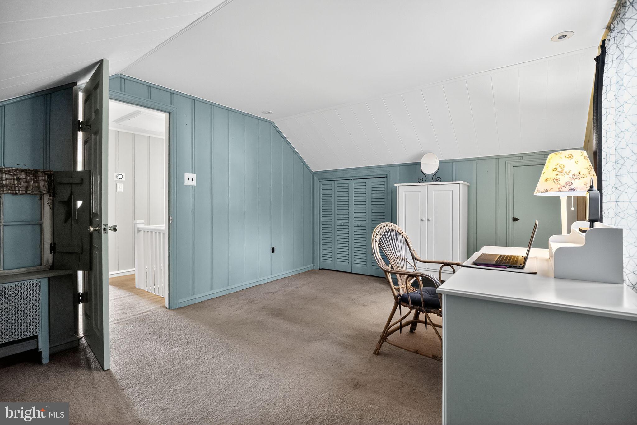 927 Sherman Avenue Huntingdon Valley, PA 19006 - Photo 20 of 29 a workspace with furniture and a lamp