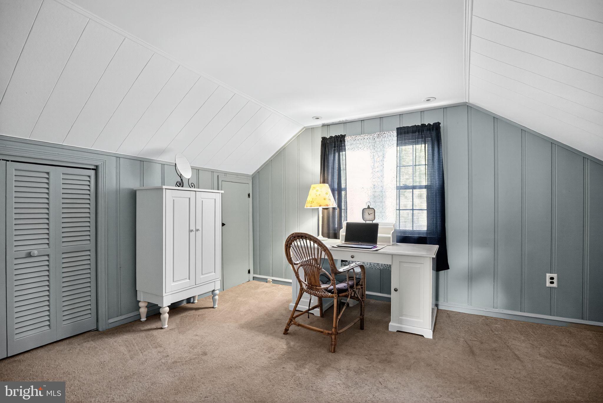 927 Sherman Avenue Huntingdon Valley, PA 19006 - Photo 21 of 29 a view of a workspace with furniture and a window