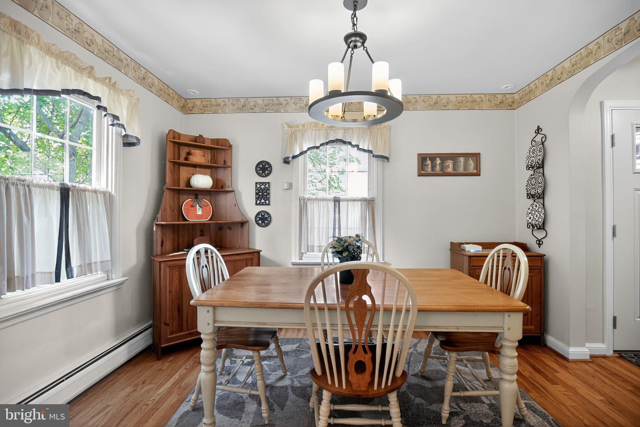 927 Sherman Avenue Huntingdon Valley, PA 19006 - Photo 10 of 29 a view of a dining room with furniture window and wooden floor