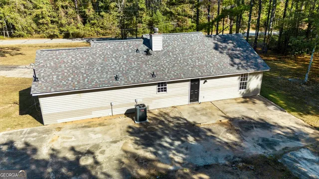 a view of a yard with tree s