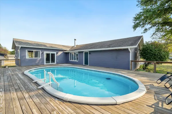 swimming pool view with a outdoor space