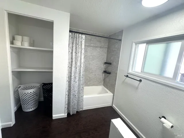 a bathroom with a sink and a bathtub