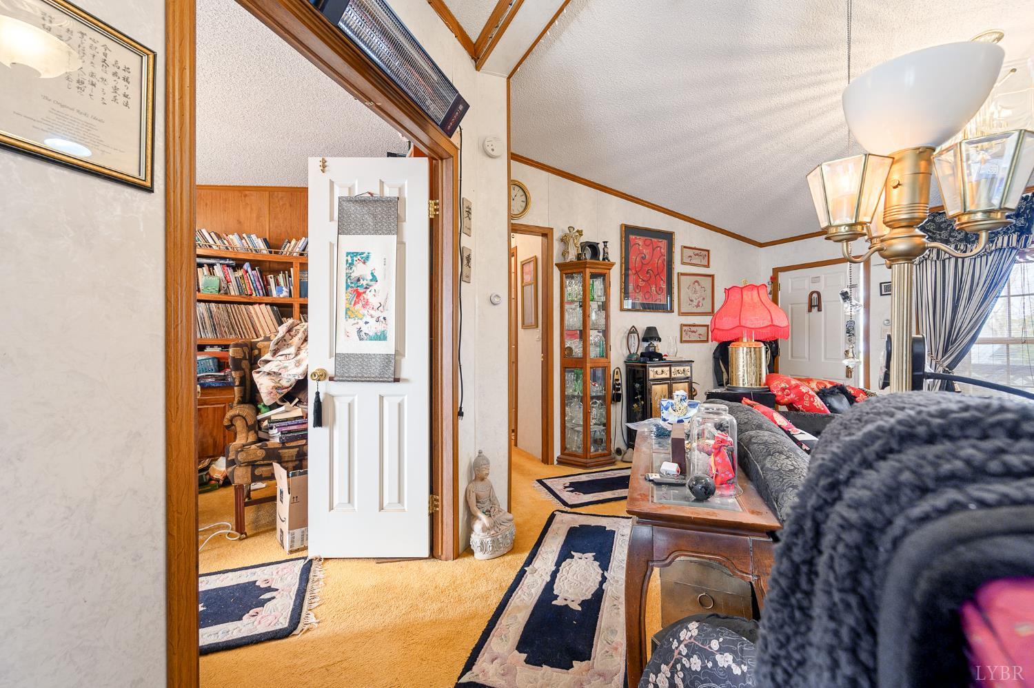 4400 Murray Hollow Road Thaxton, VA 24174 - Photo 22 of 56 a view of walk in closet with clothes and shoes
