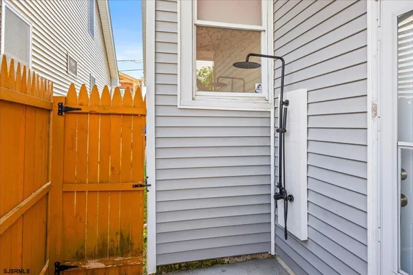 a view of a house with a door and a window
