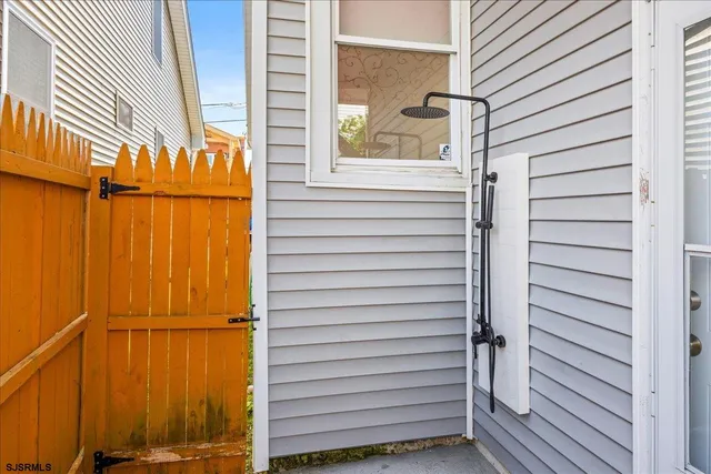 a view of a house with a door and a window