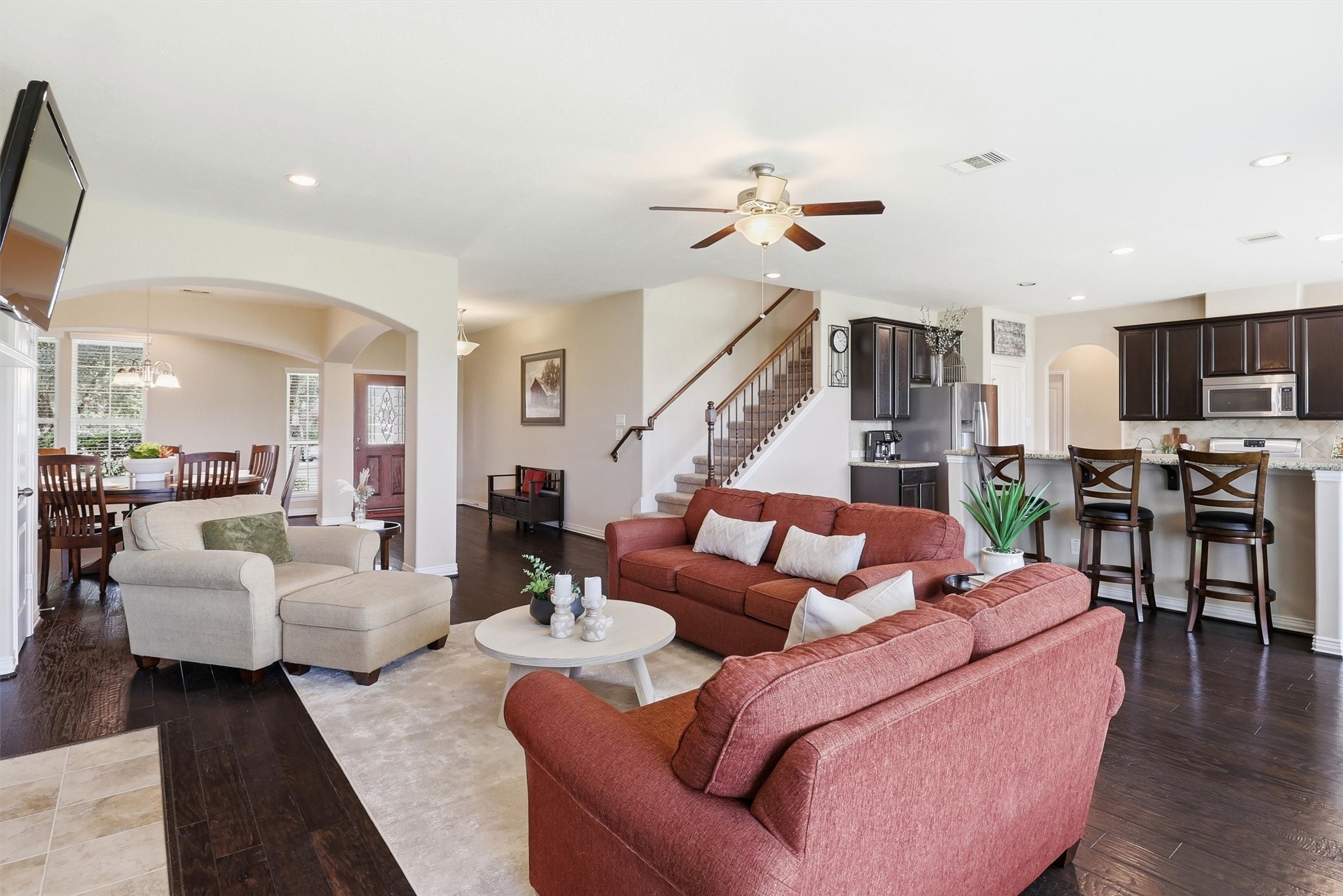 3219 Cotton Ranch Drive Katy, TX 77494 - Photo 5 of 45 Designed to be the heart of the home, the expansive family room offers a warm and welcoming atmosphere for both everyday living and memorable gatherings.