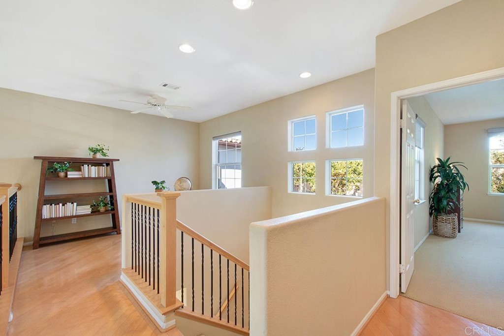 1723 Bluebird Lane Carlsbad, CA 92011 - Photo 15 of 33 a view of a hallway with bedroom and furniture