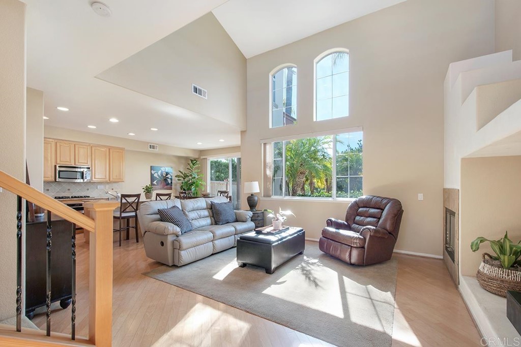 1723 Bluebird Lane Carlsbad, CA 92011 - Photo 2 of 33 a living room with furniture and a large window