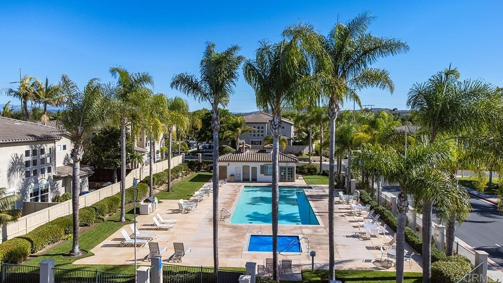 1723 Bluebird Lane Carlsbad, CA 92011 - Photo 31 of 33 a view of swimming pool with outdoor seating and city view