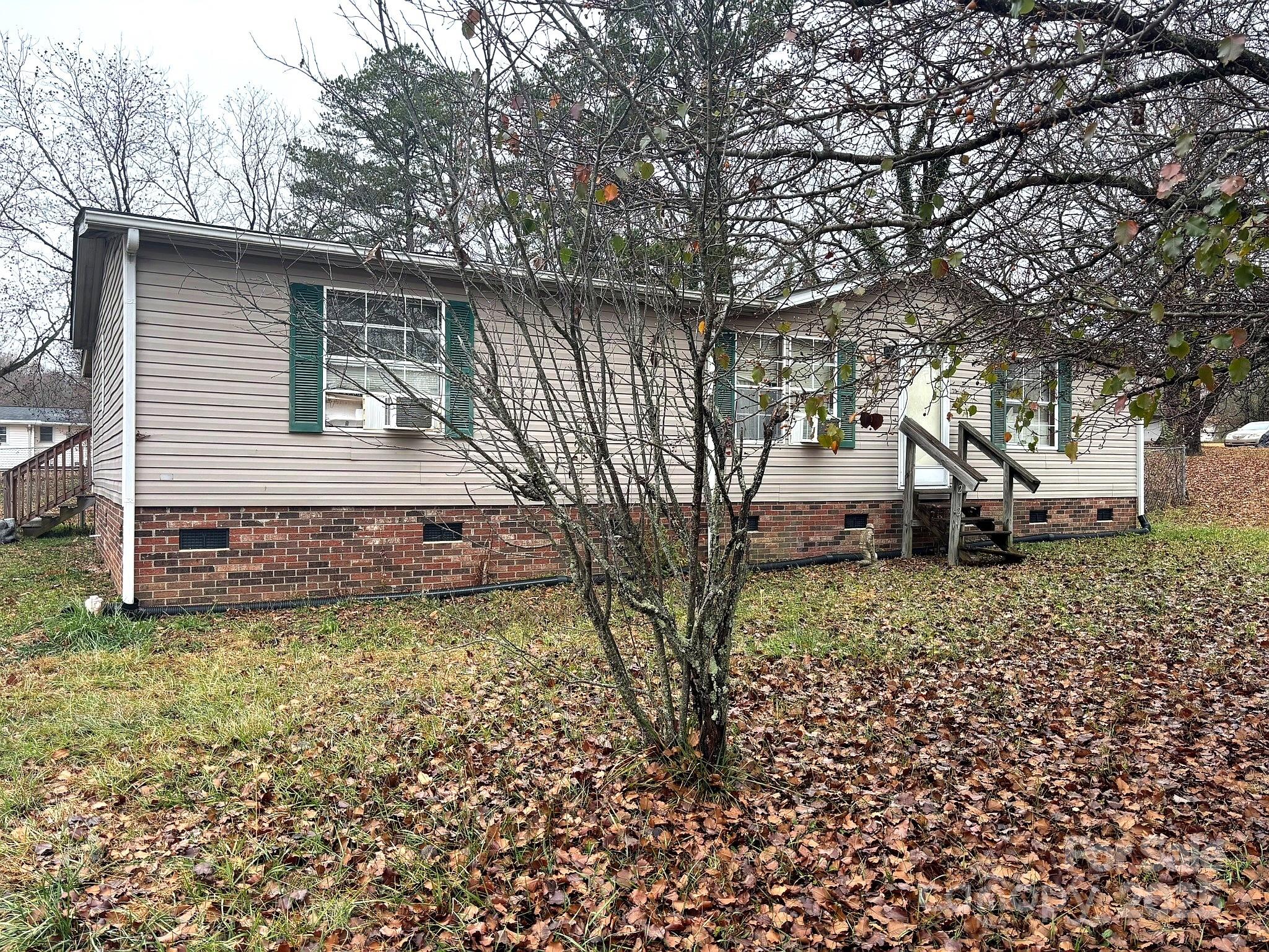 212 South Upright Street Landis, NC 28088 - Photo 1 of 21 a view of a house with a yard