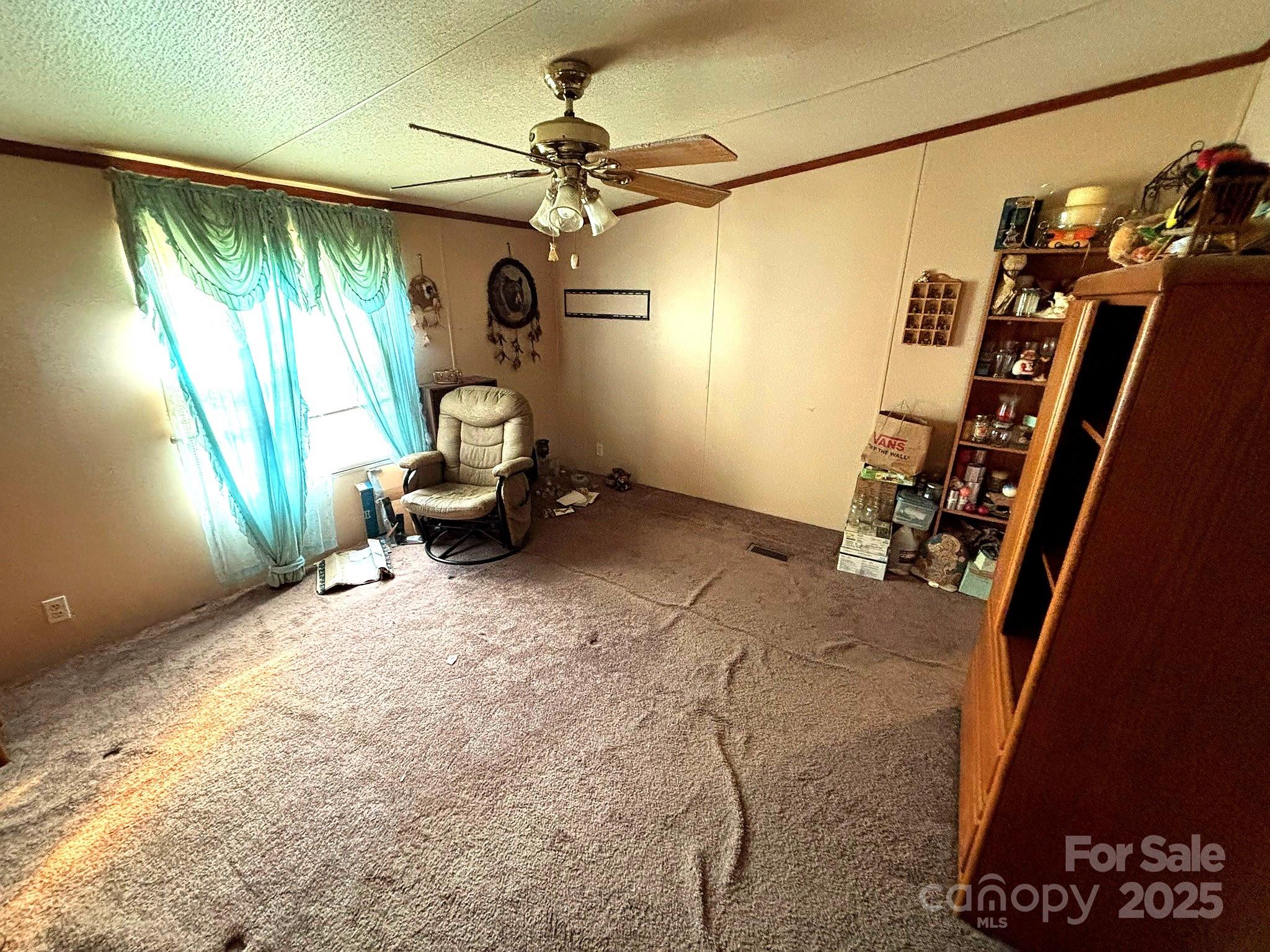 212 South Upright Street Landis, NC 28088 - Photo 14 of 21 a bedroom with a bed and a window