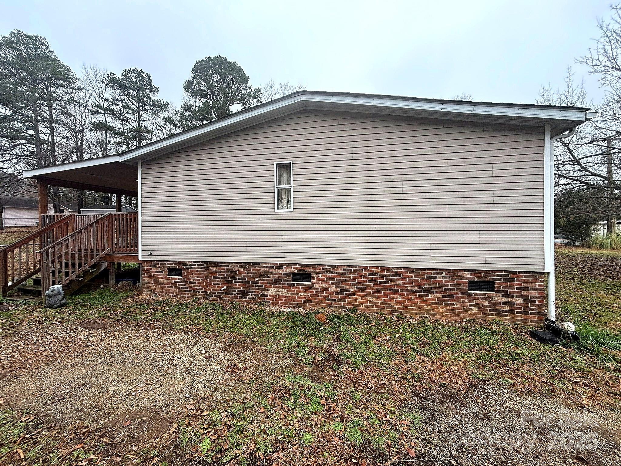 212 South Upright Street Landis, NC 28088 - Photo 3 of 21 a front view of a house with a yard
