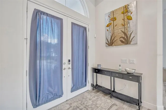 a view of kitchen with cabinets and wooden floor