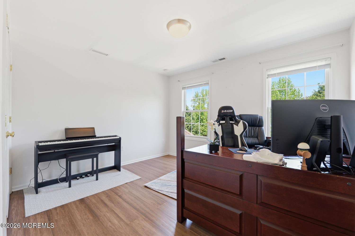 7 Cherry Tree Lane Cream Ridge, NJ 08514 - Photo 31 of 47 a view of a workspace with furniture and wooden floor