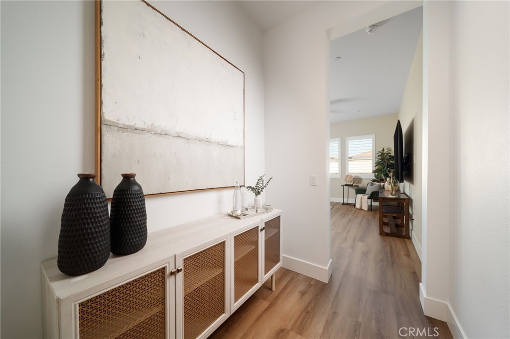17042 Meteor Way Riverside, CA 92503 - Photo 23 of 75 a bathroom with a double vanity sink and a mirror