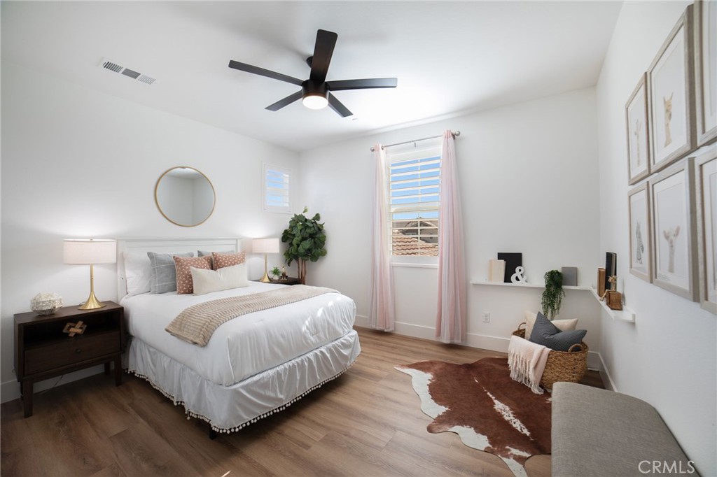 17042 Meteor Way Riverside, CA 92503 - Photo 41 of 75 a bedroom with a bed and window