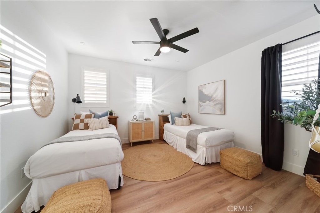 17042 Meteor Way Riverside, CA 92503 - Photo 46 of 75 a room with bed mirror and window