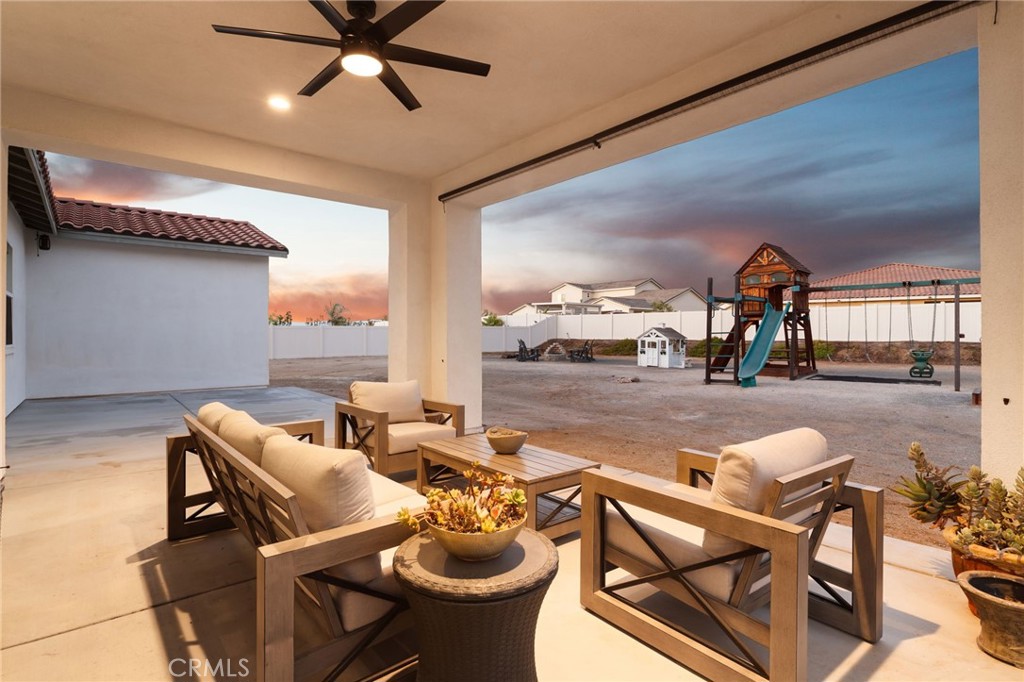 17042 Meteor Way Riverside, CA 92503 - Photo 48 of 75 a view of a livingroom with furniture and a kitchen view