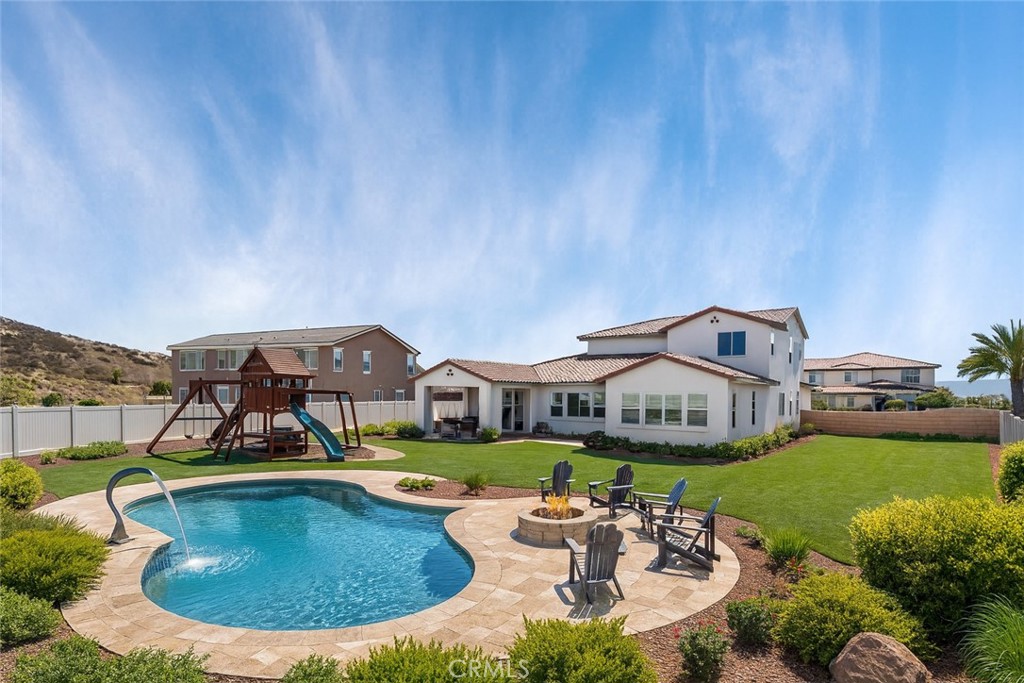 17042 Meteor Way Riverside, CA 92503 - Photo 53 of 75 an aerial view of a house with swimming pool lake view and mountain view