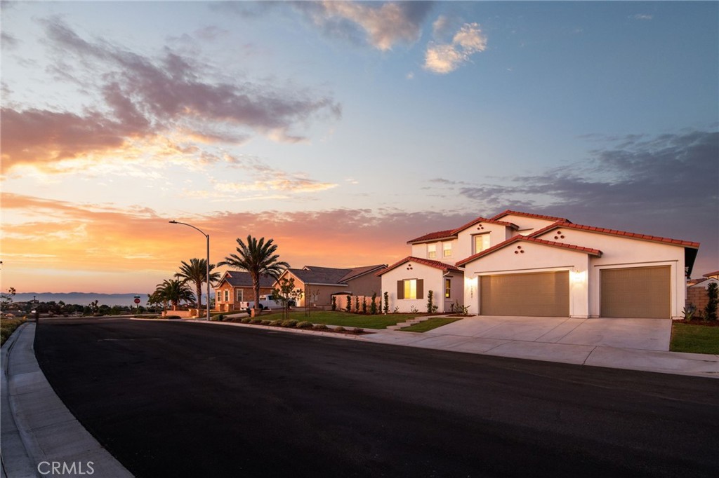17042 Meteor Way Riverside, CA 92503 - Photo 58 of 75 a front view of a house with a garden