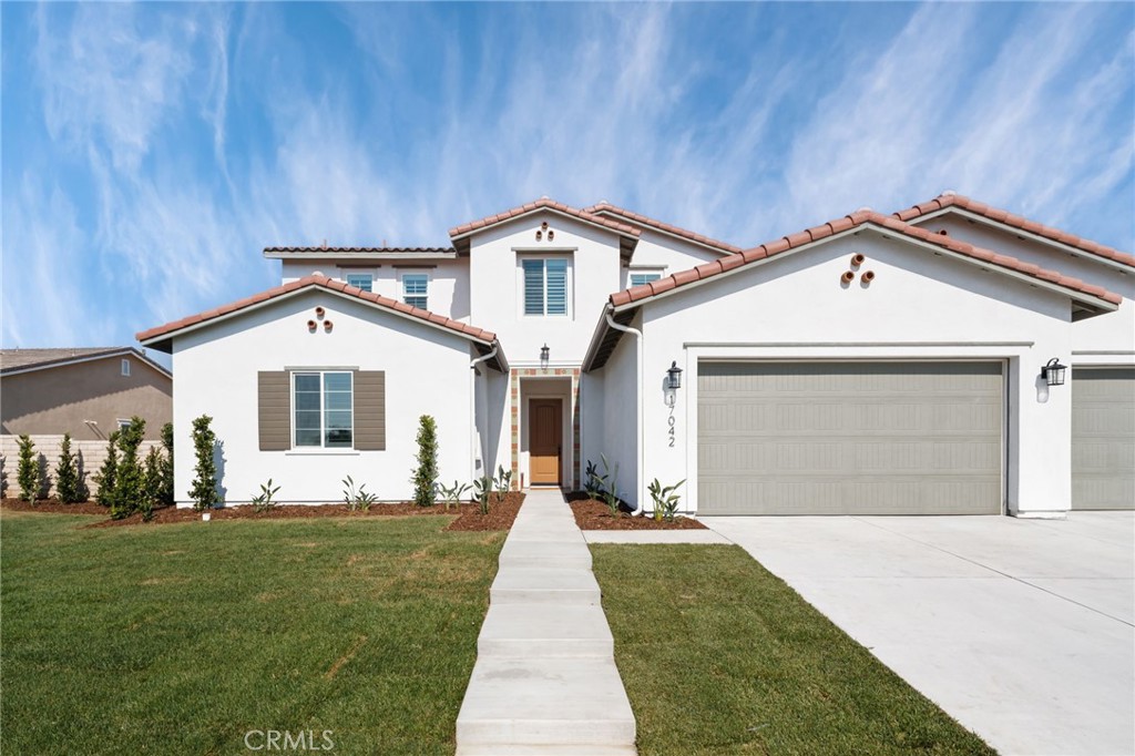 17042 Meteor Way Riverside, CA 92503 - Photo 60 of 75 a front view of a house with a yard