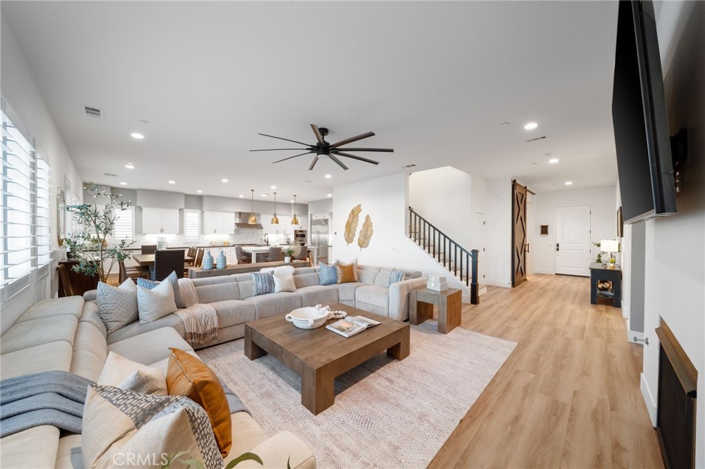 17042 Meteor Way Riverside, CA 92503 - Photo 6 of 75 a living room with furniture and a flat screen tv