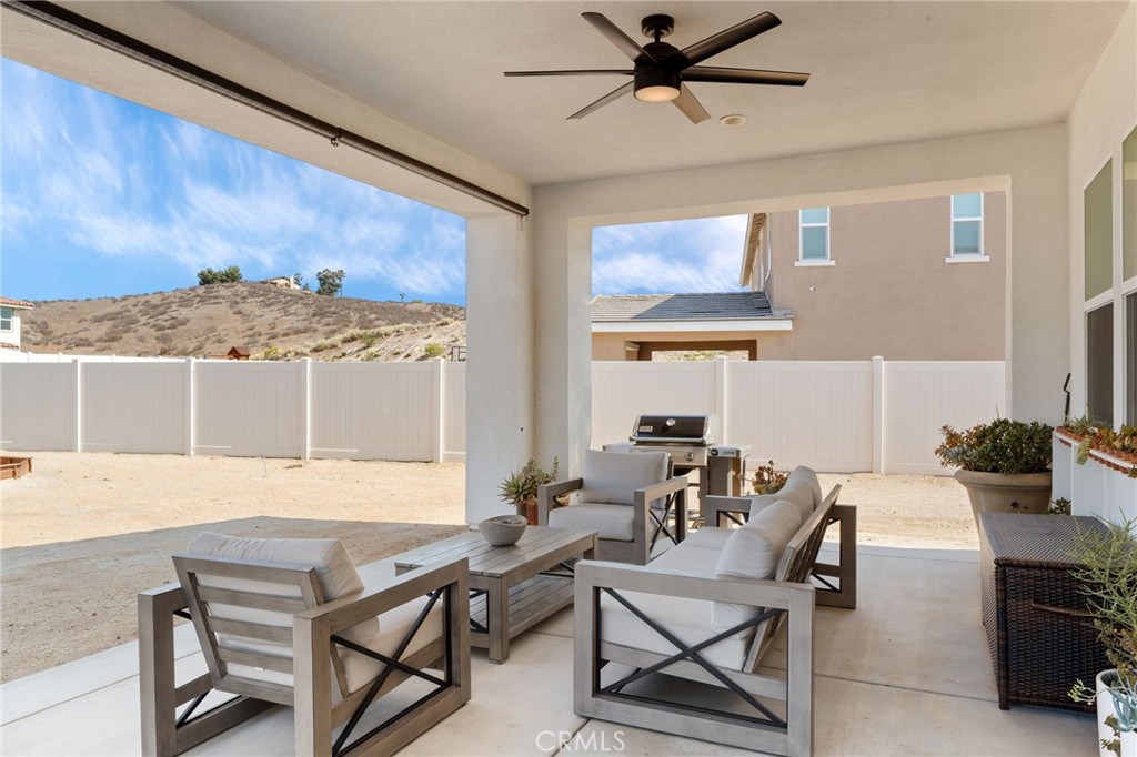 17042 Meteor Way Riverside, CA 92503 - Photo 62 of 75 a view of a dining room with furniture window and wooden floor