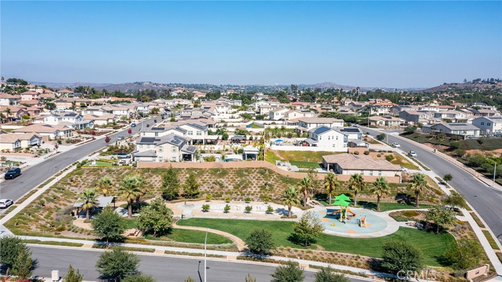 17042 Meteor Way Riverside, CA 92503 - Photo 66 of 75 an aerial view of a city with lots of residential buildings