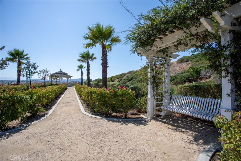 17042 Meteor Way Riverside, CA 92503 - Photo 72 of 75 a front view of a house with a yard and potted plants