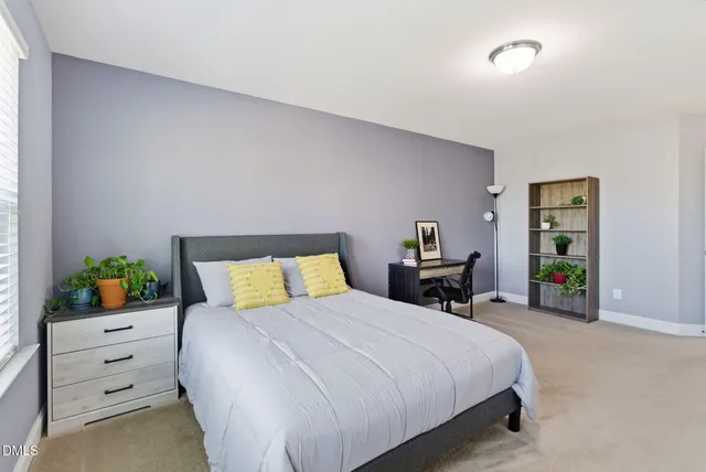 an aerial view of a city with lots of residential buildings