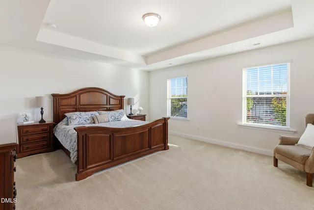 a picture of a room with a white wall and white cabinet
