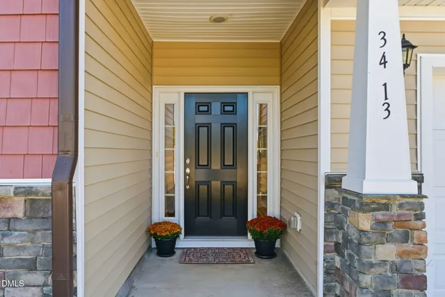 a bathroom with a shower and a sink