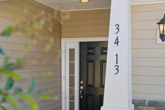 a bedroom with a bed and a table in it
