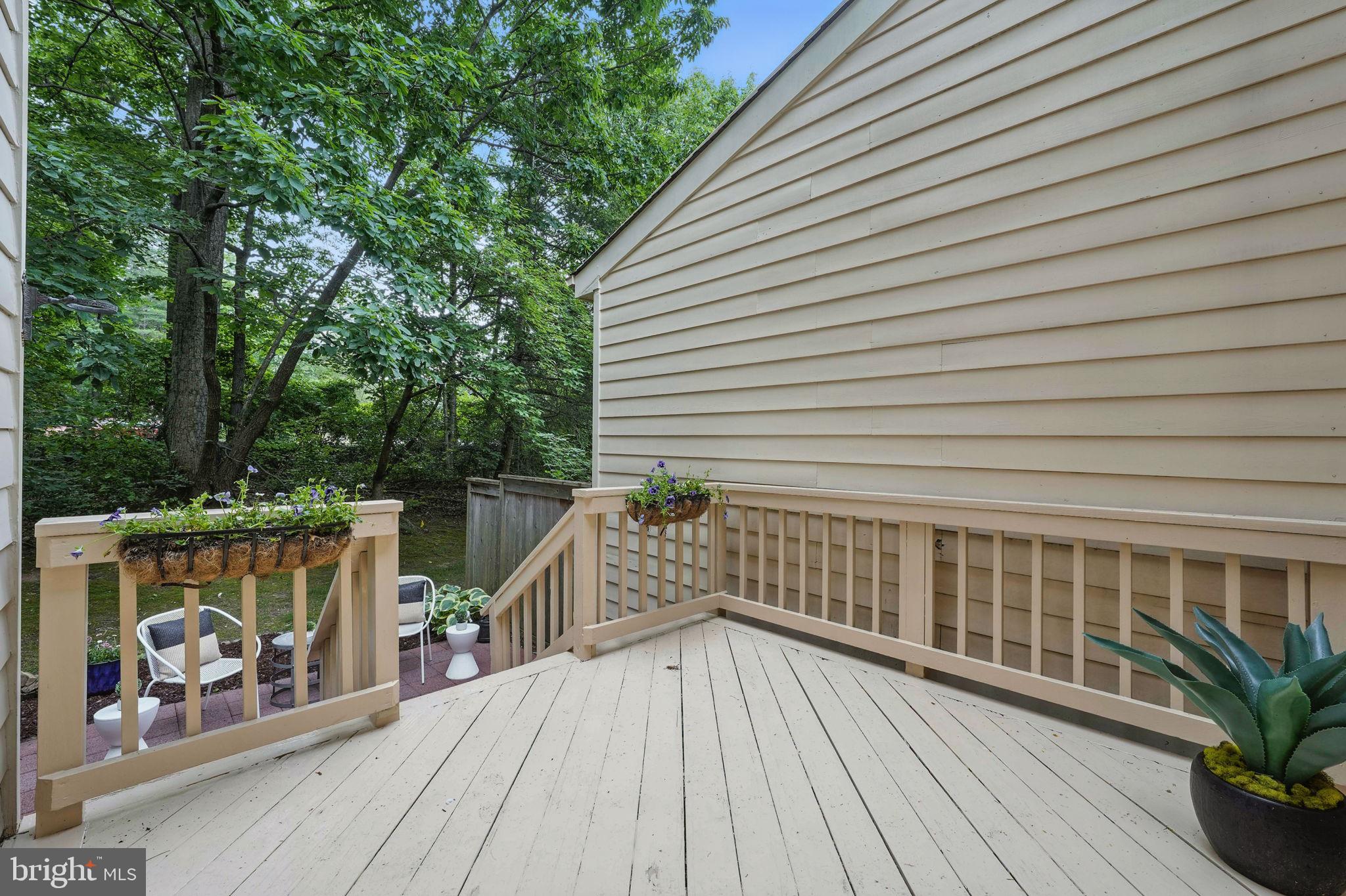 1393 Heritage Oak Way Reston, VA 20194 - Photo 11 of 80 a view of deck with wooden floor and seating space