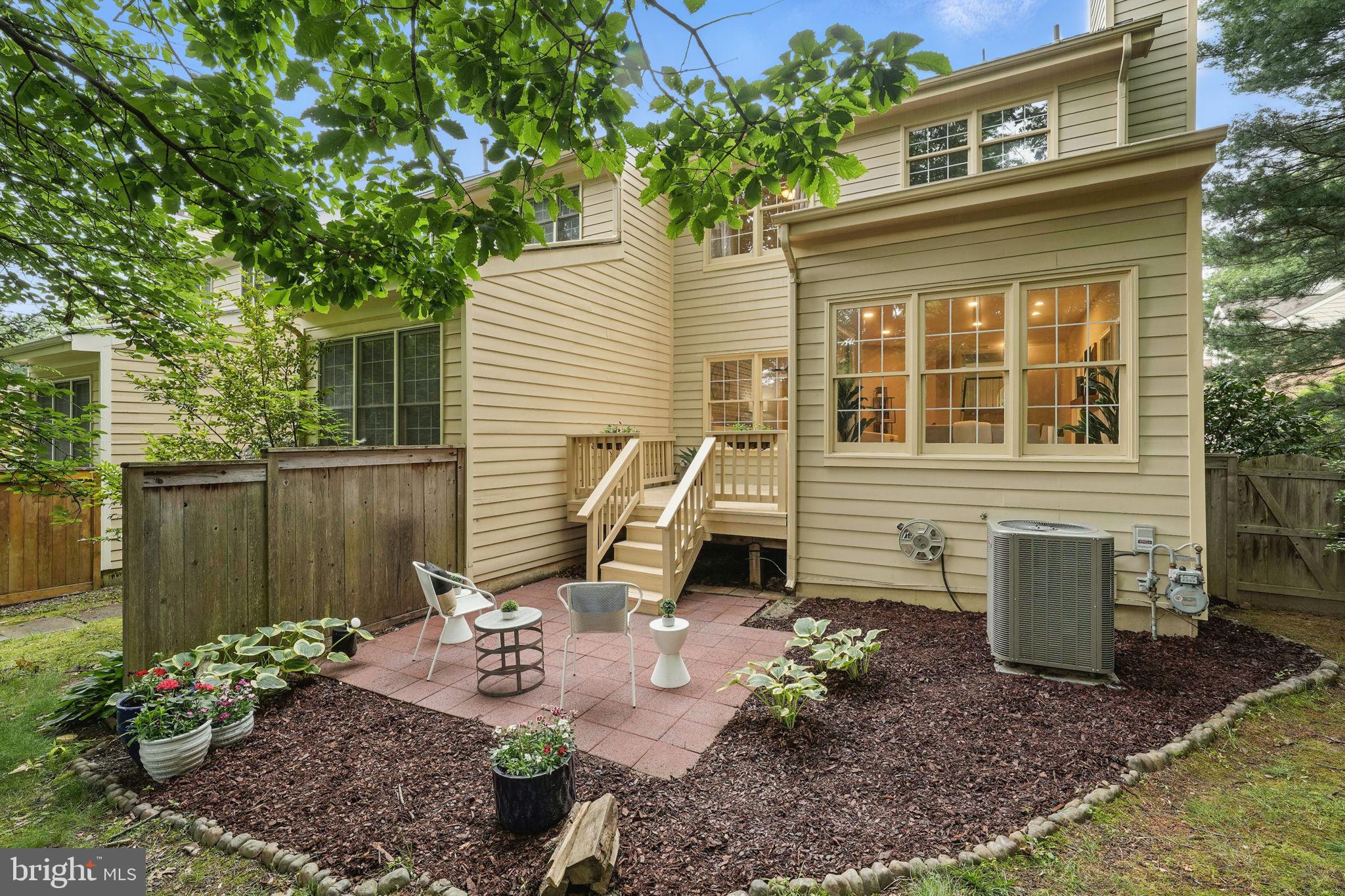 1393 Heritage Oak Way Reston, VA 20194 - Photo 12 of 80 Private corner yard with deck and patio