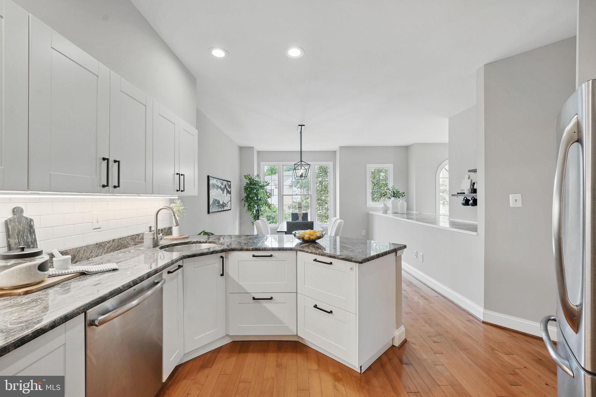 1393 Heritage Oak Way Reston, VA 20194 - Photo 15 of 80 Fully renovated kitchen with custom cabinetry