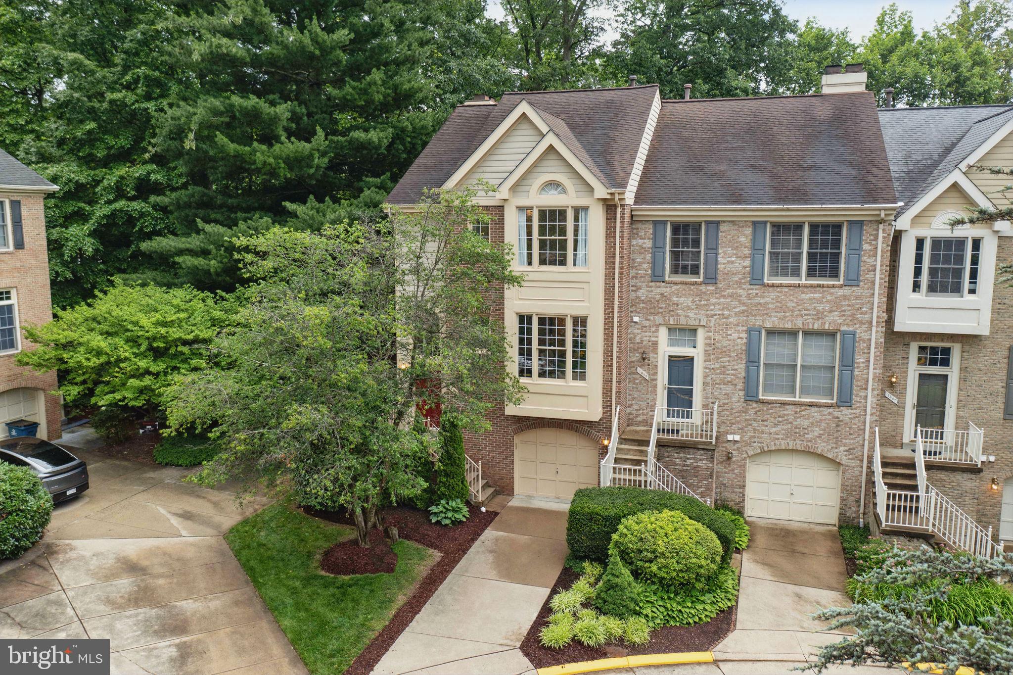 1393 Heritage Oak Way Reston, VA 20194 - Photo 2 of 80 a front view of a house with a yard