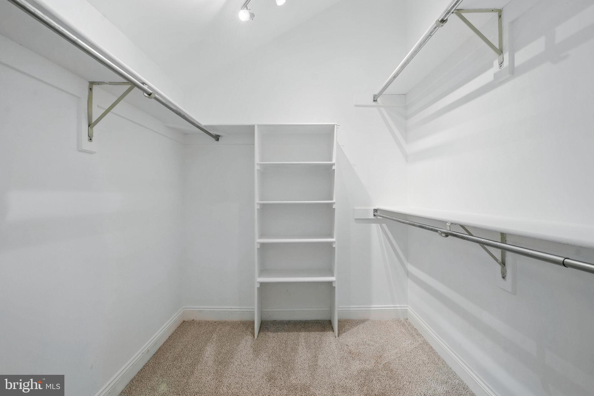 1393 Heritage Oak Way Reston, VA 20194 - Photo 31 of 80 a view of an empty walk in closet