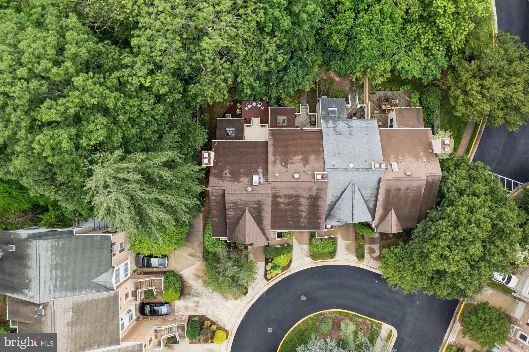 1393 Heritage Oak Way Reston, VA 20194 - Photo 46 of 80 an aerial view of a house with garden space and a street view
