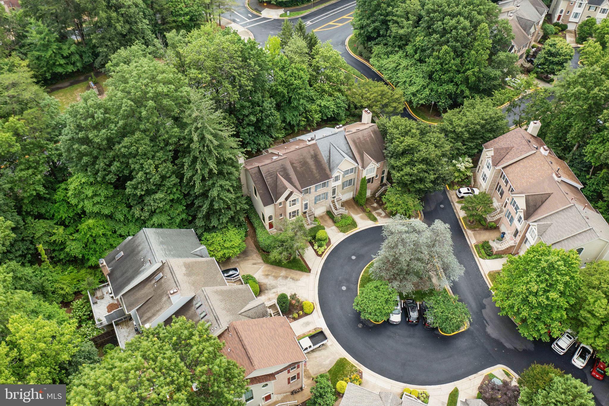1393 Heritage Oak Way Reston, VA 20194 - Photo 50 of 80 an aerial view of a house with garden space and outdoor seating
